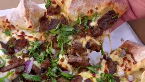 Would you eat this cheesy Carne Asada Pizza Got this delicious pizza from