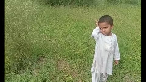 Muhammad usaid cute baby playing in mangoes garden