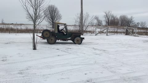 Playing in the Snow in the Willys CJ2A