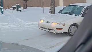 Car Crosses Despite Missing One Wheel