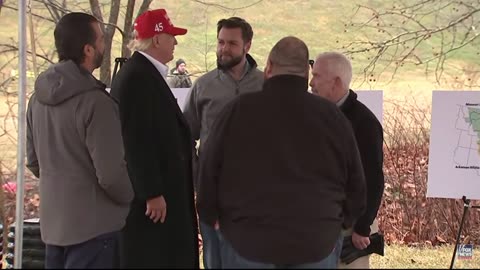 Trump is walking in East Palestine with the mayor of the town and JD Vance