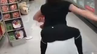 Girl in black tights at store dances and falls down