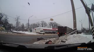 Truck Trailer Takes Out Car