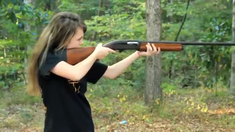 Young Girl Fires a ShotGun to show Hillary How it is Done