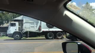 Wallcon Mack MR front loader driving bye.