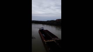 Large Tugboat Almost Loses Control Around River Bend