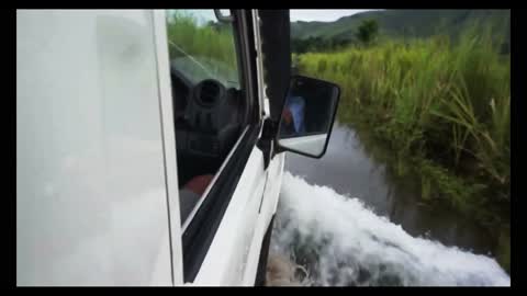 Crossing A Flooded Road