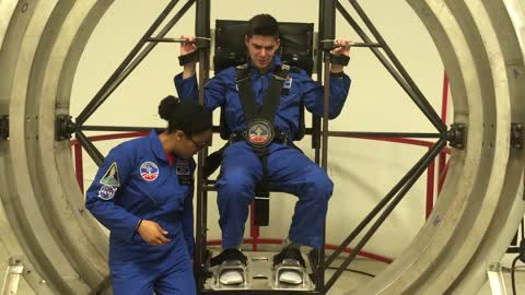 Getting spun around in a multi-axis trainer at NASA space camp