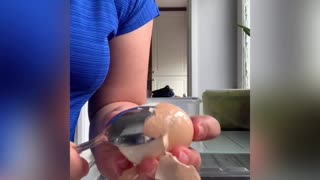 Quickly Cleaning a Hard-Boiled Egg with a Spoon