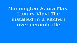 Mannington Adura Luxury Vinyl Plank installed over an existing ceramic tile floor in a kitchen.