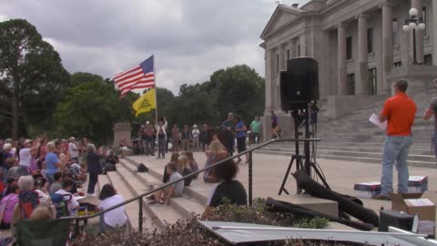 Doc Washburn talking about losing his job at Arkansas Rally against Vaccine Mandates 3