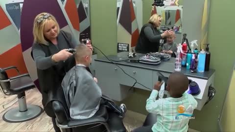 Two Boys Share Friendship with a Haircut