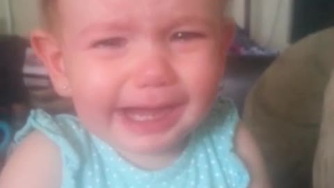 Emotional baby bursts into tears at mom's singing