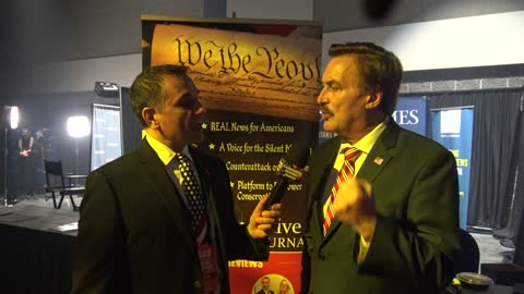 Mike Lindell at the Turning Point USA with John Di Lemme