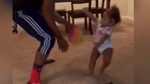 Baby gets "embarrassed" in 1-on-1 basketball with dad