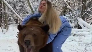 this woman has a pet bear