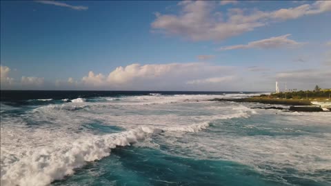 aerial drone view of ocean waves splash around tenerife canary islands spain