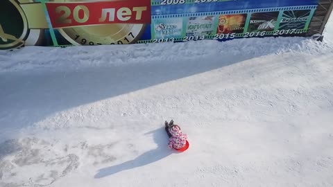 Child on a fun ice slide