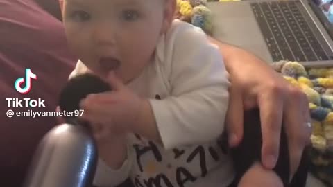 Cute Baby Plays With A Vibrator