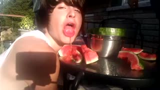 Local watermelon stand offers watermelon to kids