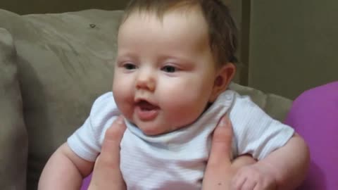 Little cute baby laughs with his mother !