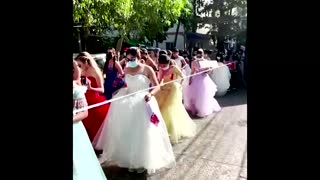 Women in ball gowns protest against Myanmar coup