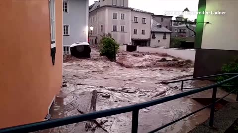 Footage shows torrential flood waters in Austrian town