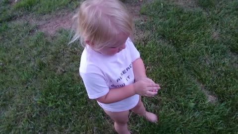 Catching her first firefly