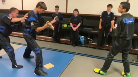 Spin inside axe kick break