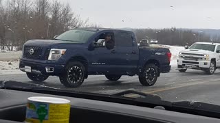 Truck Tows Other Truck on Icy Uphill Road