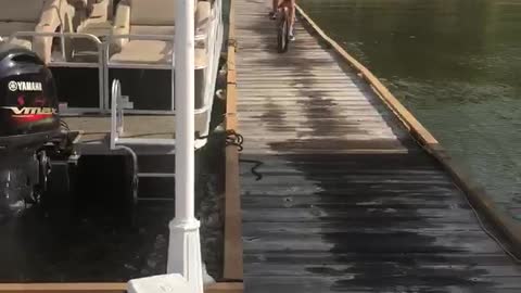 Dad Jumping BMX Bike into Lake Fails