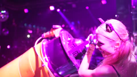 Paris Hilton blasts people with foam at Club Amnesia