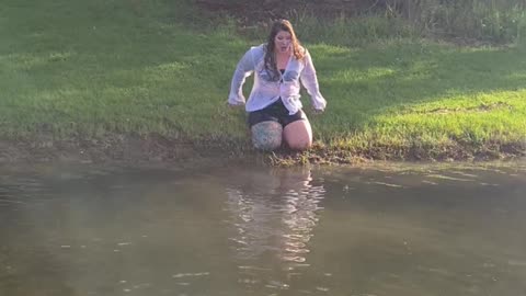Woman Pulls Off Knee Slide Faceplant Into Lake