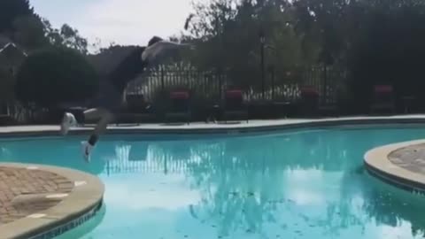 Guy Works Out An Insane Flip Over A Pool And Lands On The