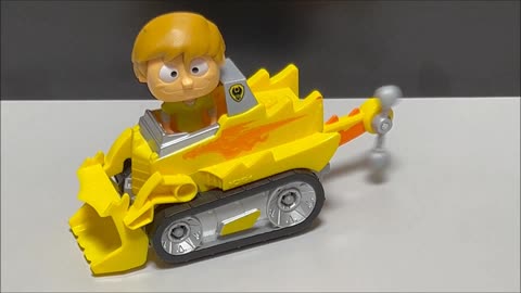 Yellow Bulldozer Toy staring Bobble Head Shaggy Rogers