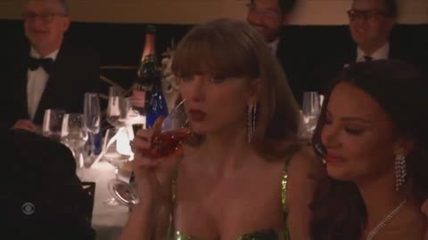 Taylor Swift Takes A Sip Of Her Drink After Jo Koy's Joke About Her At The Golden Globes