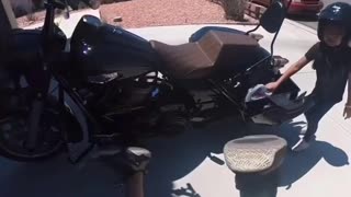 Daughter Accidently Causes Dad to Fall Off Motorcycle
