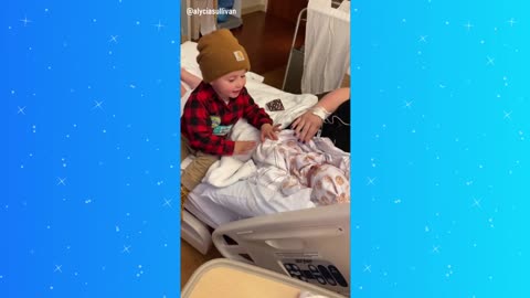 Toddler meets newborn little brother in adorable moment