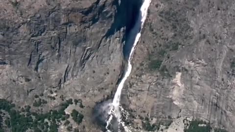 Here are stunning Yosemite aerial views of Wapama Falls and Bridal Veil Falls.