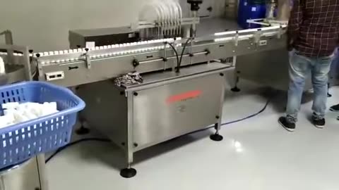 Automatic Liquid FIlling Machine Manufacturer In Ahmedabad