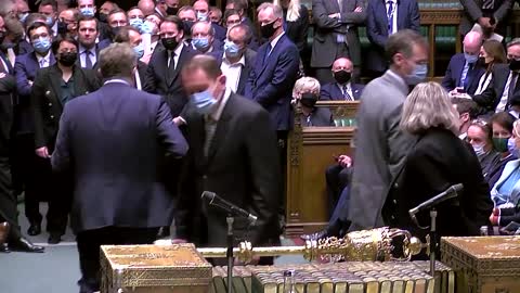 UK MPs back COVID passes despite Conservative revolt