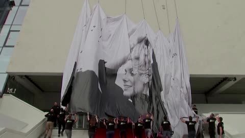 Huge poster honors Deneuve at Cannes Film Festival