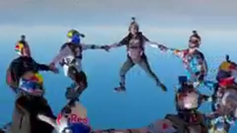 Red Bull Skydive Team > > Holding hands with friends ! Amazing