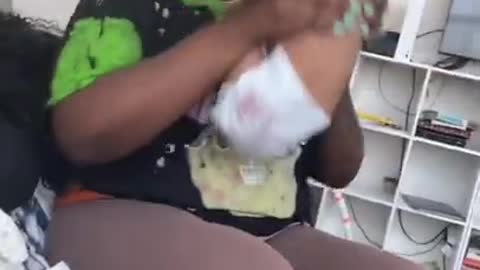 Dad catches mom getting comfortable to play with the baby!