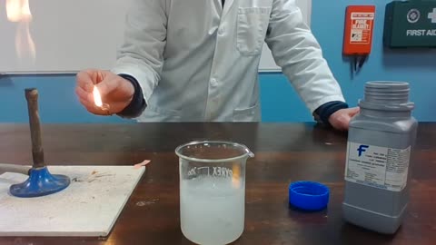 "Aqua Alchemy: Calcium's Marvelous Reaction with Water! 💦🔬