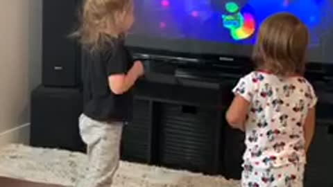 Toddler loves to rock out to Trolls World Tour