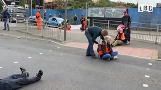 Insulate Britain protesters dragged off by angry motorists