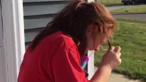 Slowmo glasses girl gets sprayed by silly string