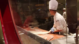 Cook making handmade noodles at Caesars Palace in Las Vegas.