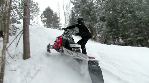 Into The Trees Dusting A Hill Jockey! | Just Snowmobiles